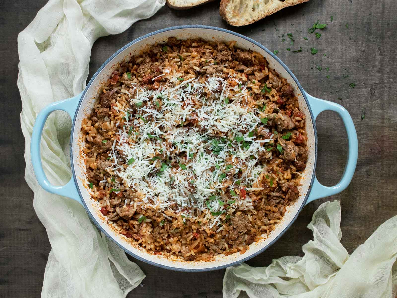 Overhead view of Marry Me Beef and Rice Skillet in a large enameled cast-iron skillet.