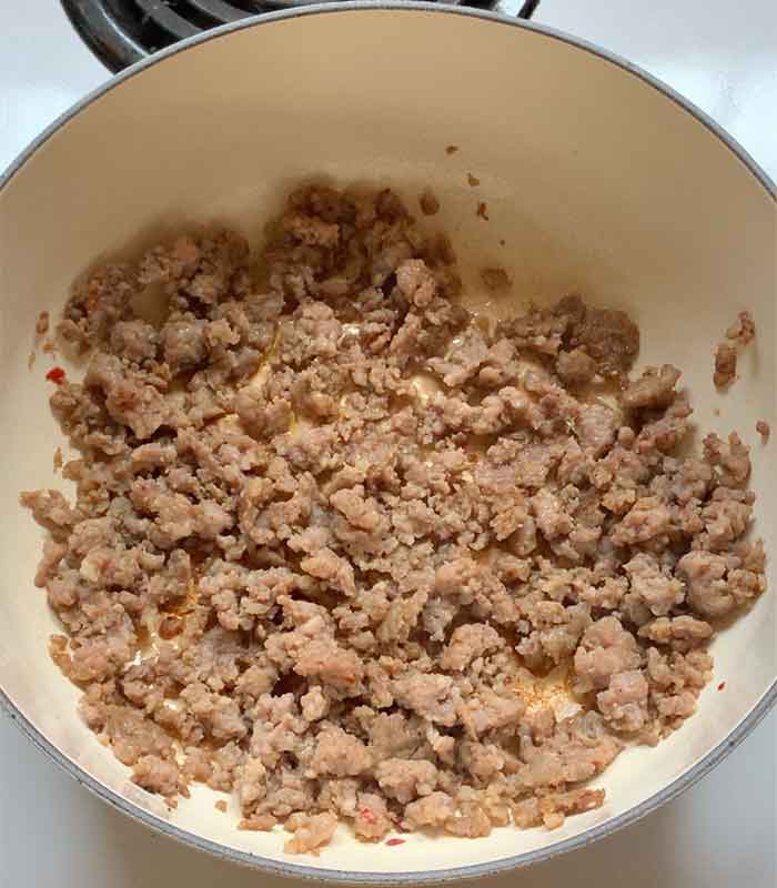 Sausage browned and ready to be removed from the pot.