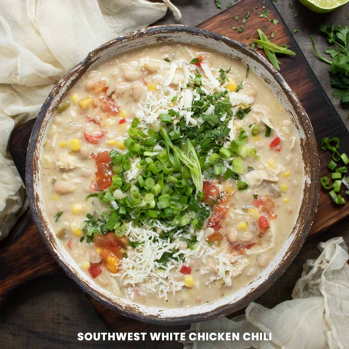 Southwest White Chicken Chili in a rustic ceramic bowl.