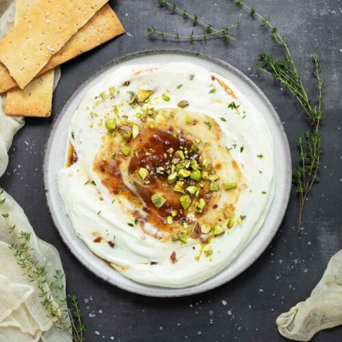 Whipped Ricotta with Fig Jam on a plate.