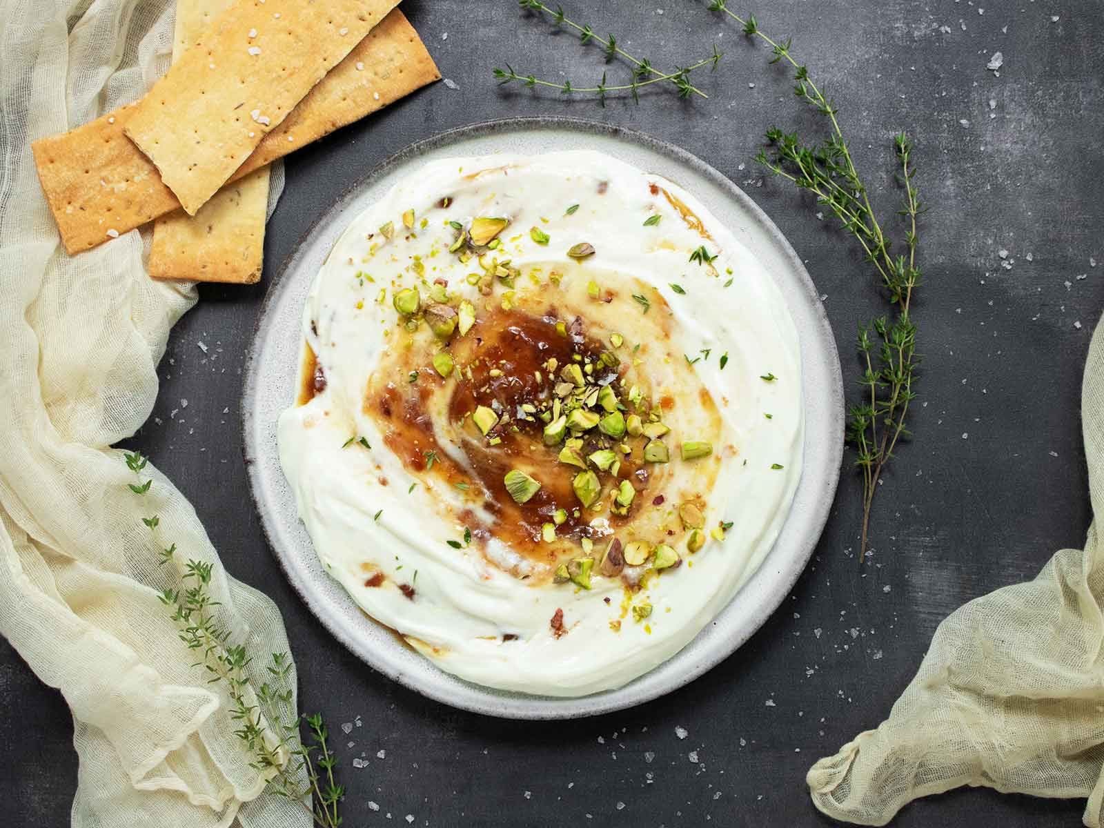 Whipped Ricotta with Fig Jam on a plate.