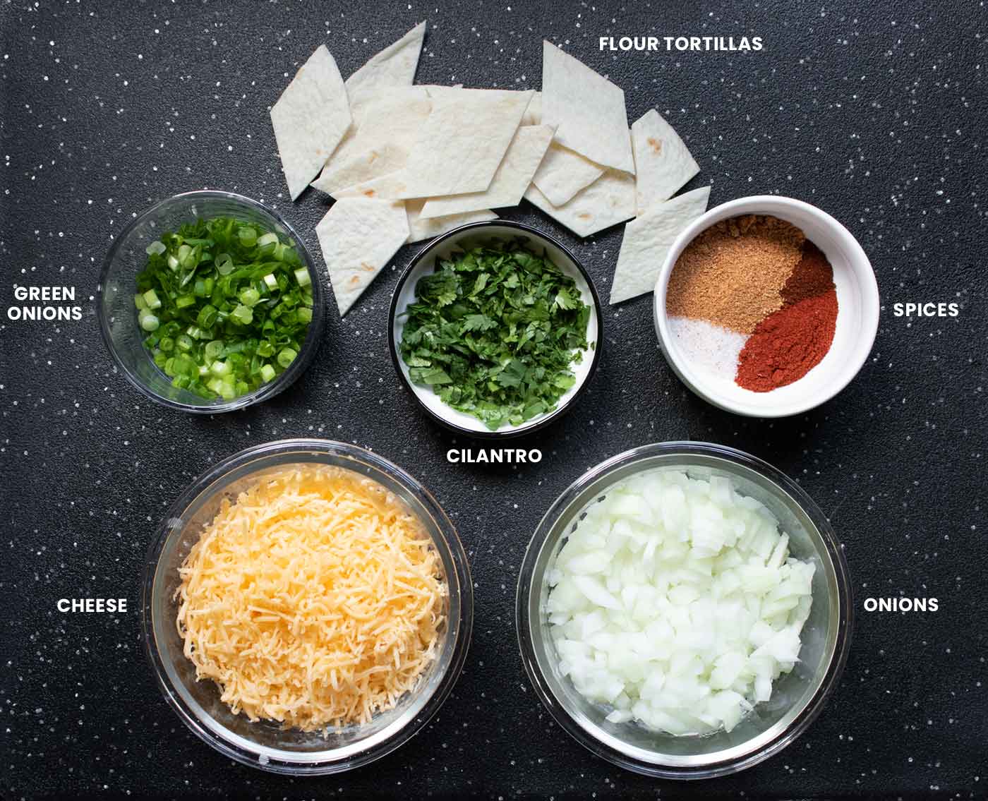 Prepped ingredients arranged on a cutting board.