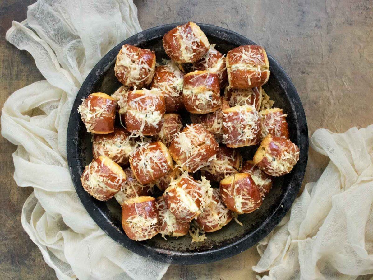 Overhead view of a plate of Cream Cheese Stuffed Ranch Pretzel Bites.