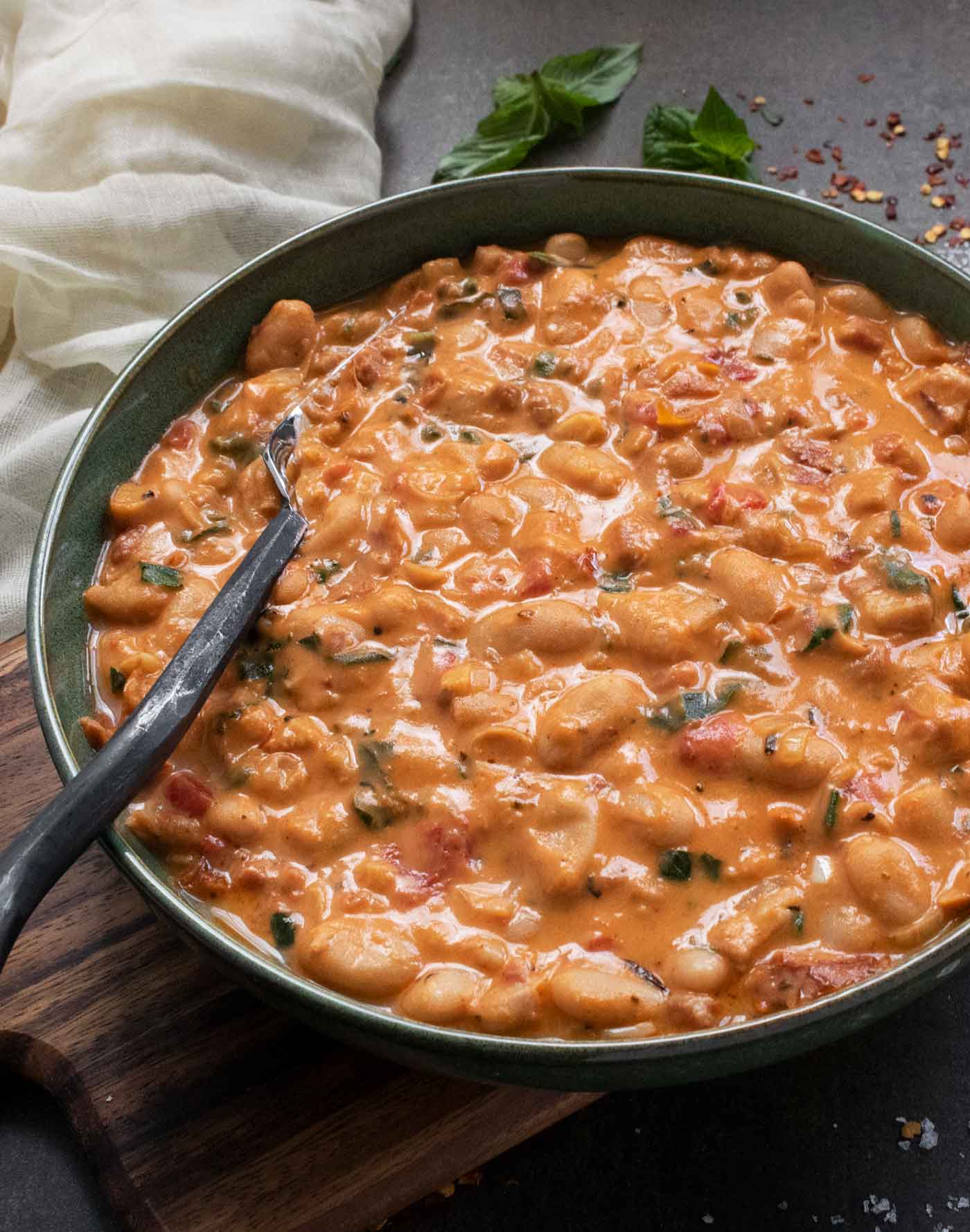 Side-angled view of a bowl of Marry Me White Beans.