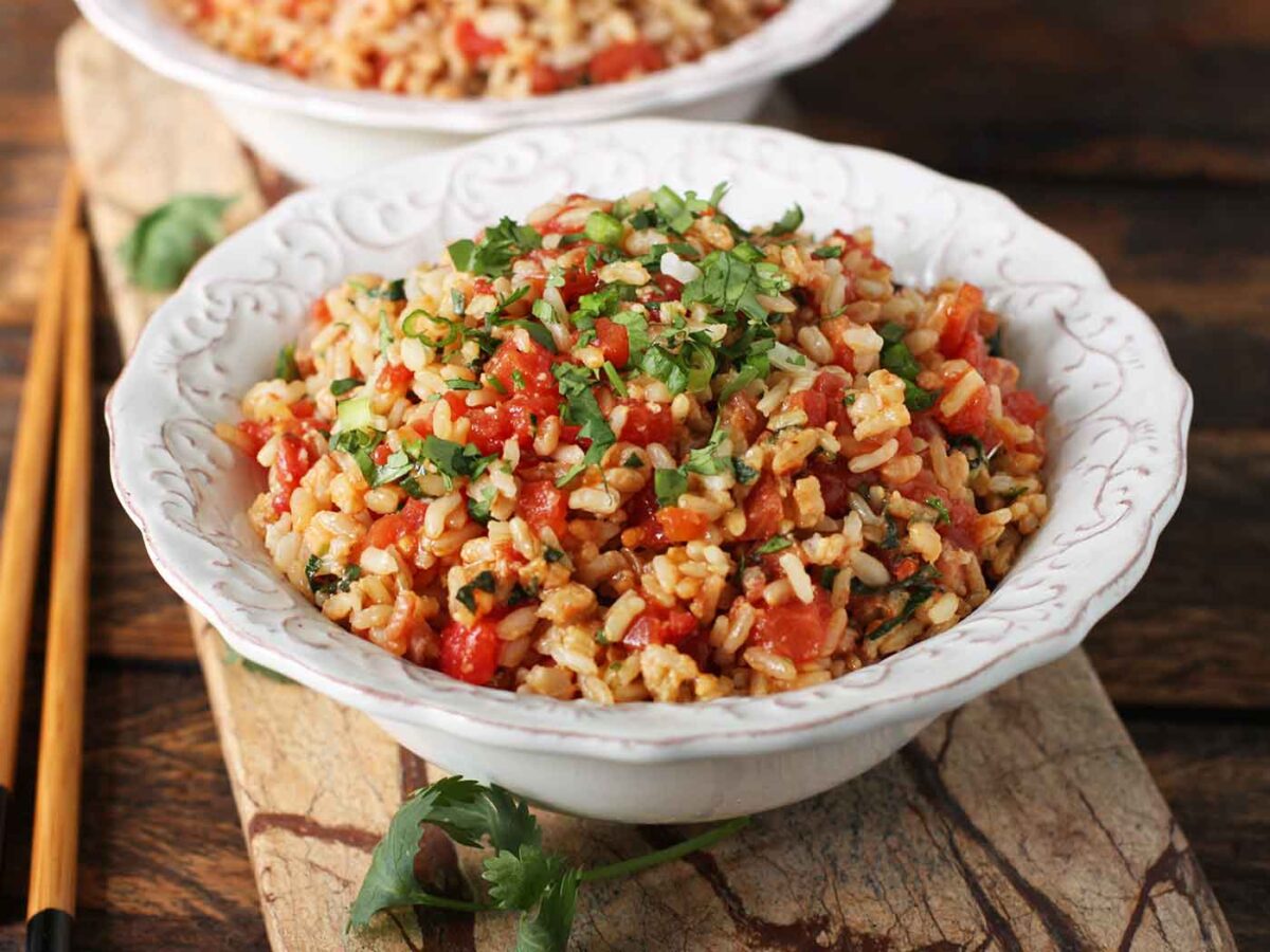 BLT Stir Fry in a white bowl with scalloped edges.