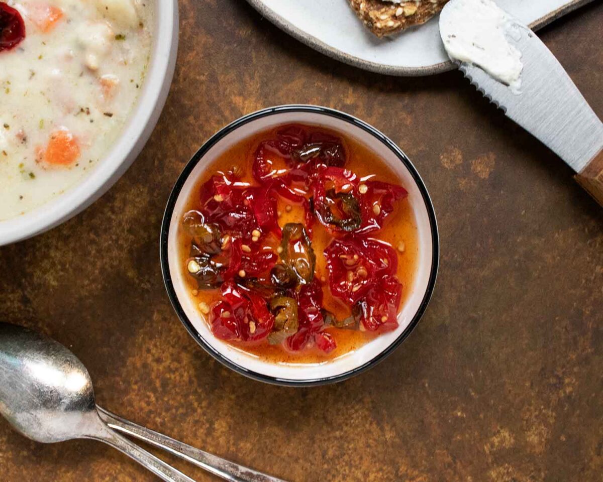 Candied Jalapenos in a white dish.