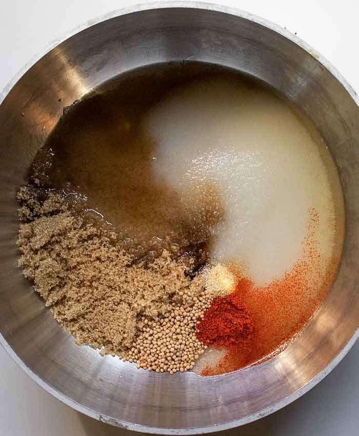 All brine ingredients in the pot, with the vinegar.