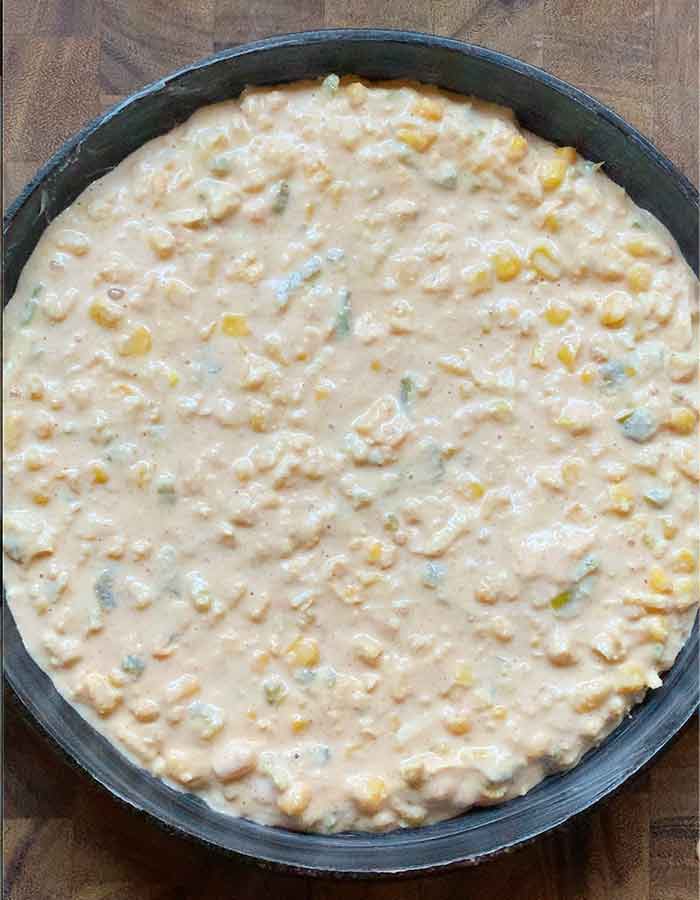 Smooth over the top and toss it into the oven.