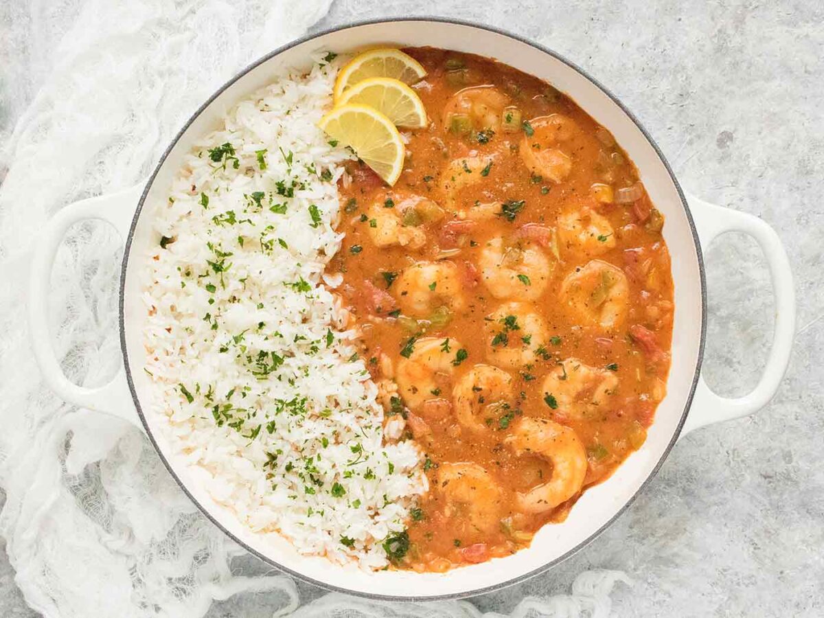 View from above of a white Dutch oven with Shrimp Etouffee and rice.