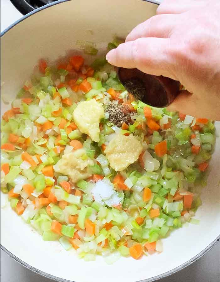 Garlic, ginger, lemongrass, salt and pepper added to the veggies.