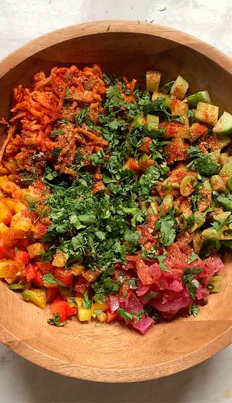 Top with lots of fresh herbs (cilantro, dill, mint).