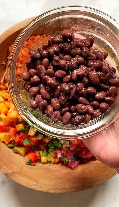 Add the beans to the bowl.