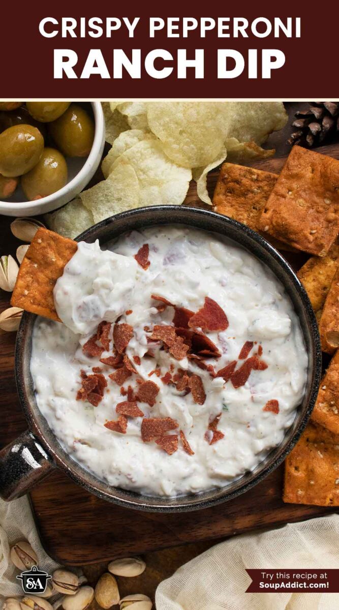 Pinterest pin image for Crispy Pepperoni Ranch Dip featuring an overhead pic of the dip in a ceramic bowl.