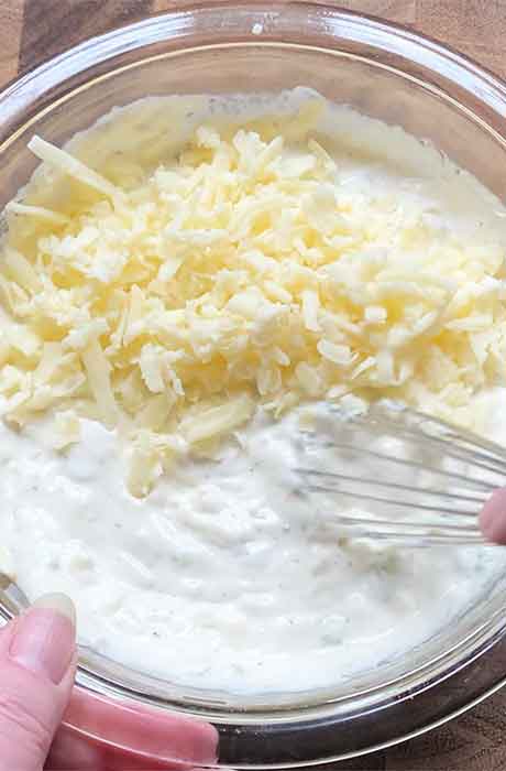 And adding in the shredded cheese.