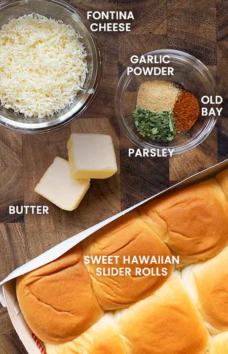 Ingredients for the slider rolls arranged on a board.