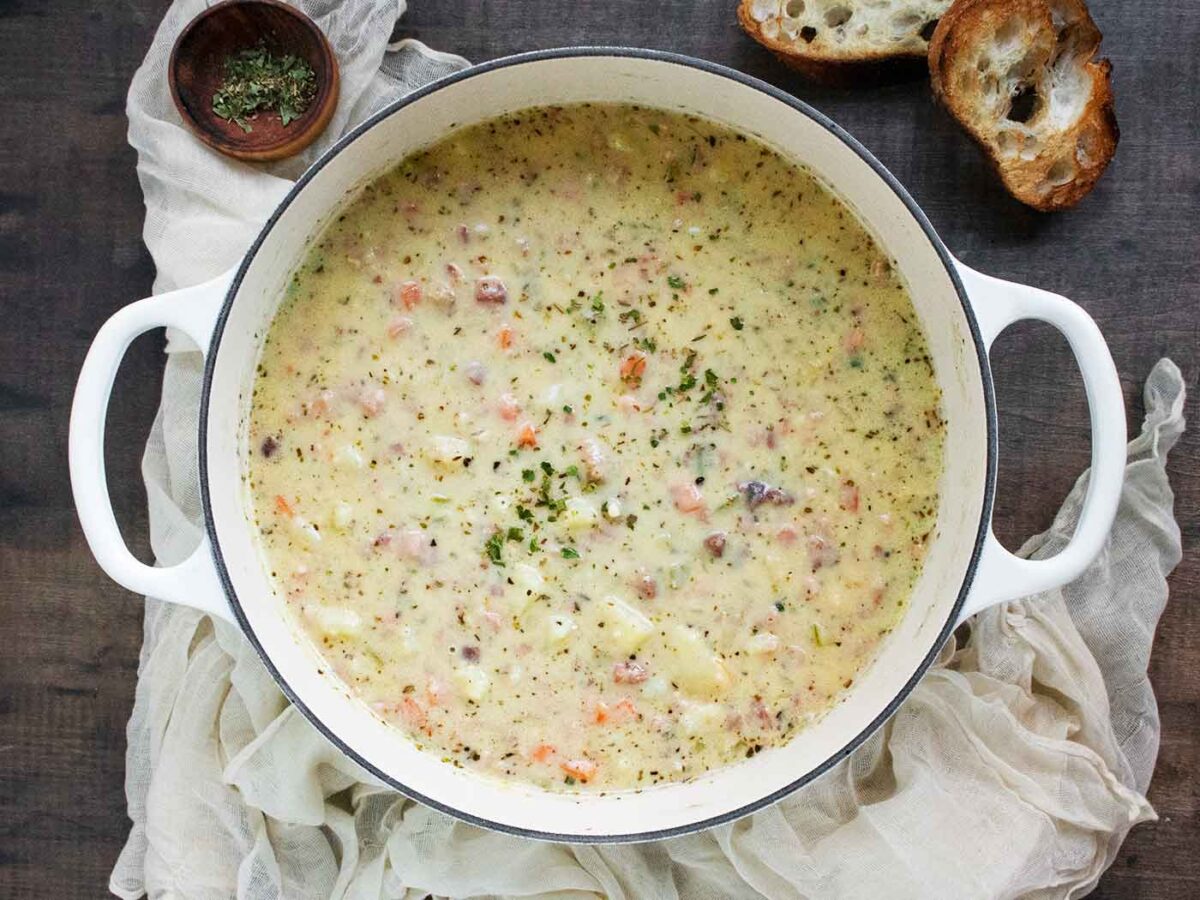 Overhead view of Ham and Potato Soup in a Dutch oven.