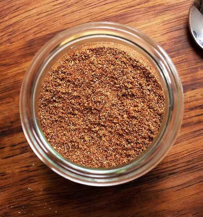 Close-up view into the jar of taco seasoning.