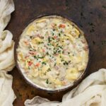 Overhead view of a bowl of Cordon Bleu Tortellini Soup.