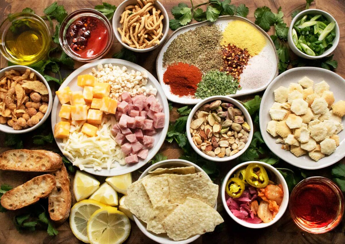 Overhead view of soup toppings arranged on a board.