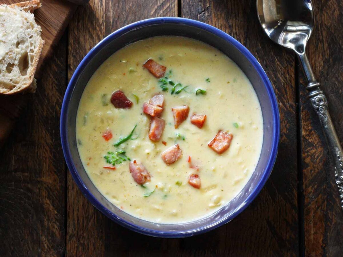 Southwest Broccoli Queso Chowder in a blue bowl.