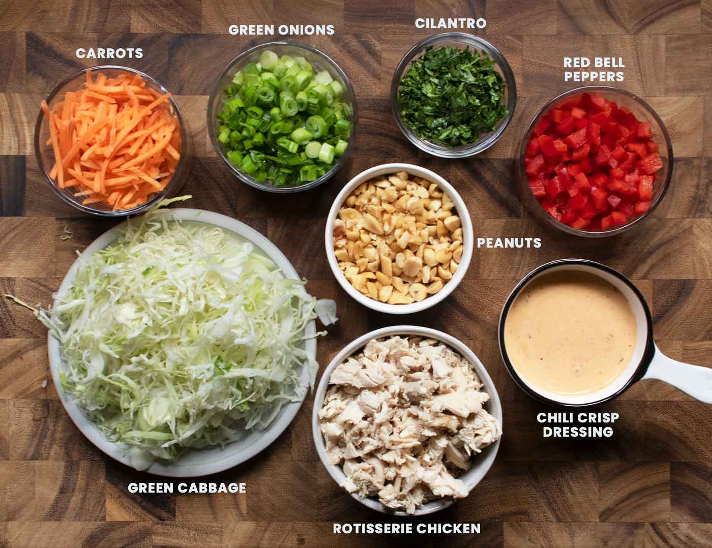 Ingredients for the salad prepped and measured out into containers, with text overlays identifying the ingredients.