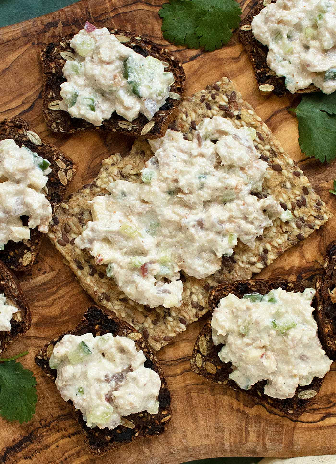 Overhead view of Hot Honey Tuna Salad on crackers and crispbread.