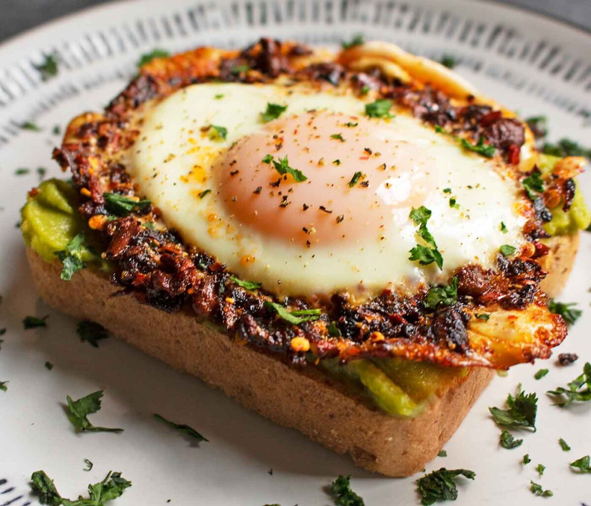 Chili Crisp Fried Egg on Avocado Toast.