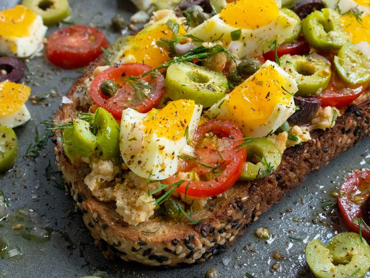 Nicoise Fried Toast on a dark gray plate.