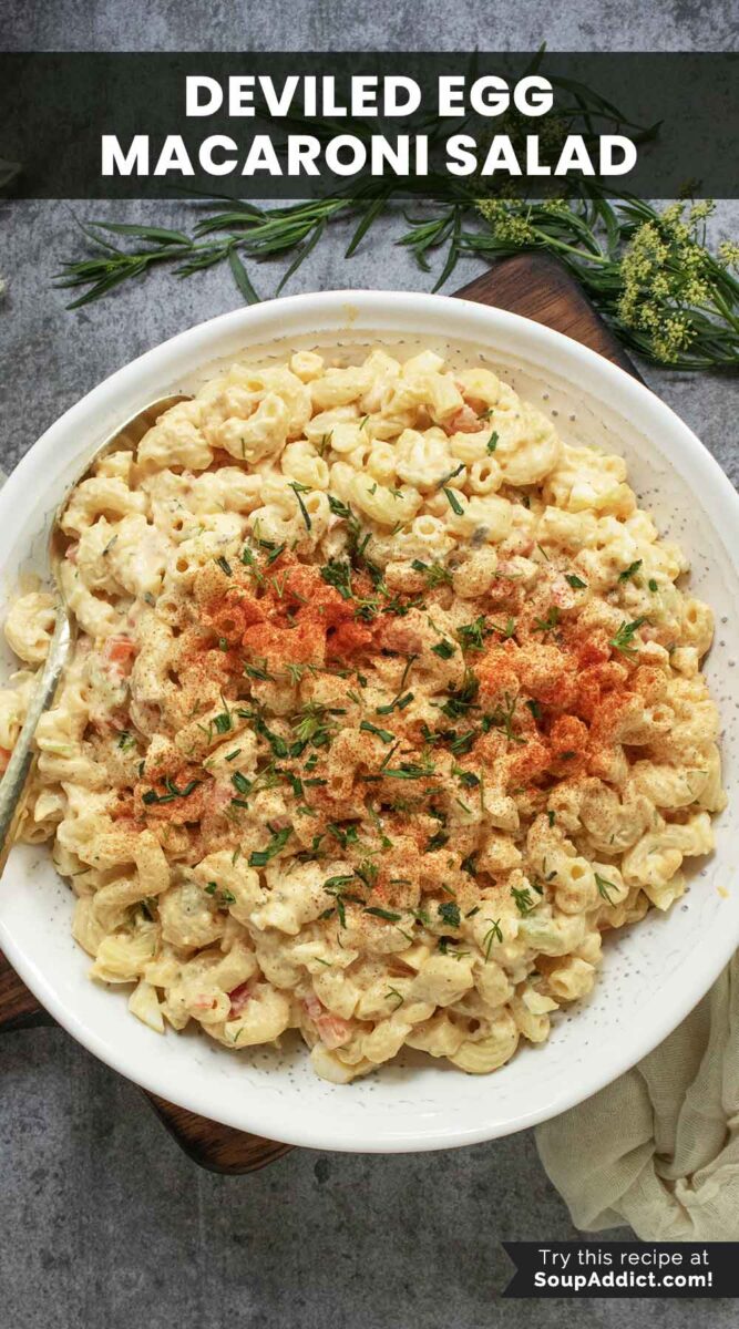 Pinterest pin image featuring a bowl of Deviled Egg Macaroni Salad.