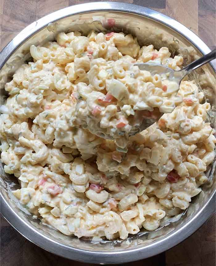 Pasta salad assembled, ready to chill and serve.