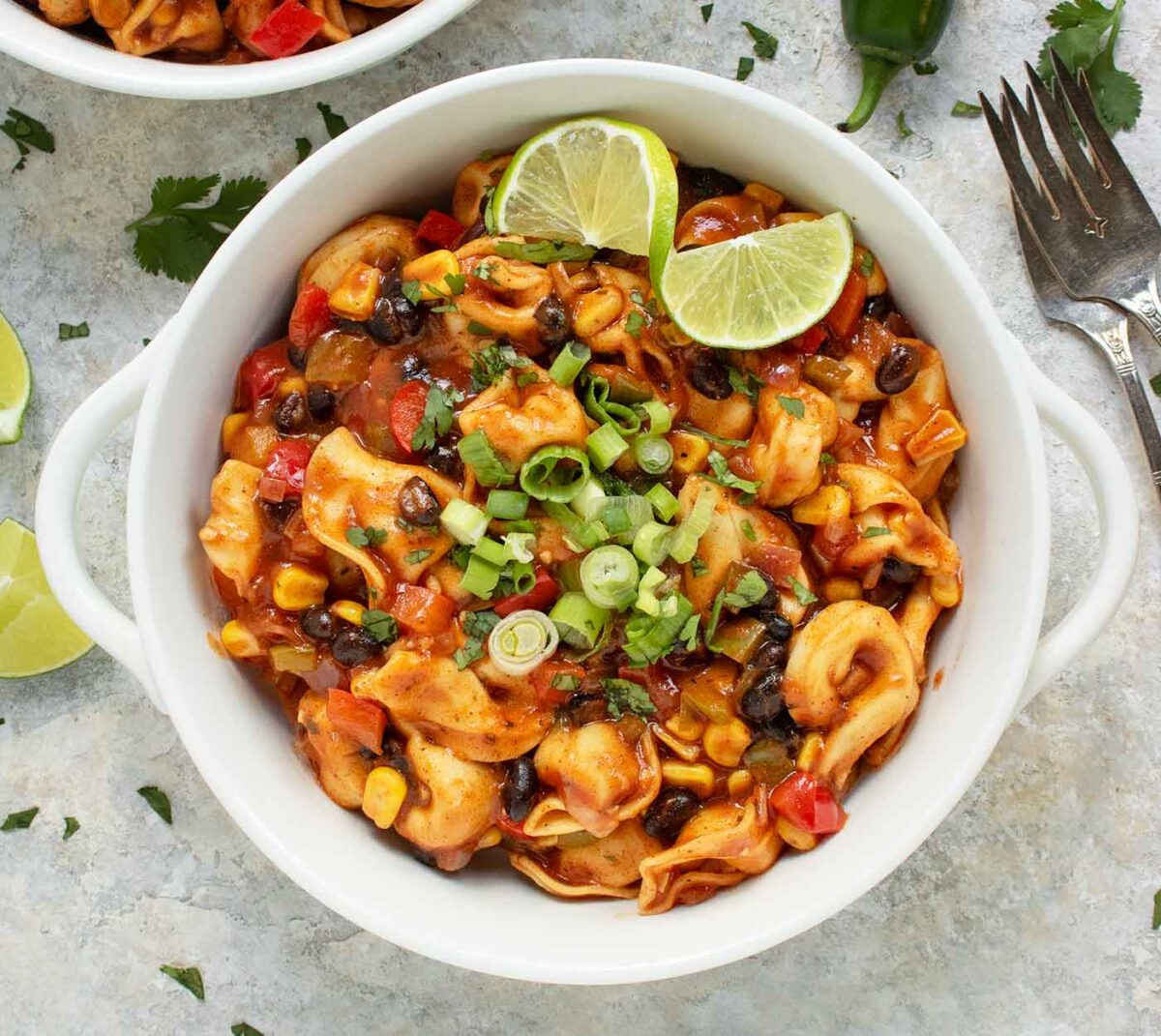 Tex Mex Tortellini in a white bowl with handles.