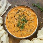A bowl of Thai Coconut Mushroom Soup.