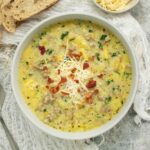 Tuscan Potato Soup in a light gray bowl.